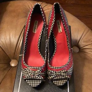 White with black checks and red striped heels